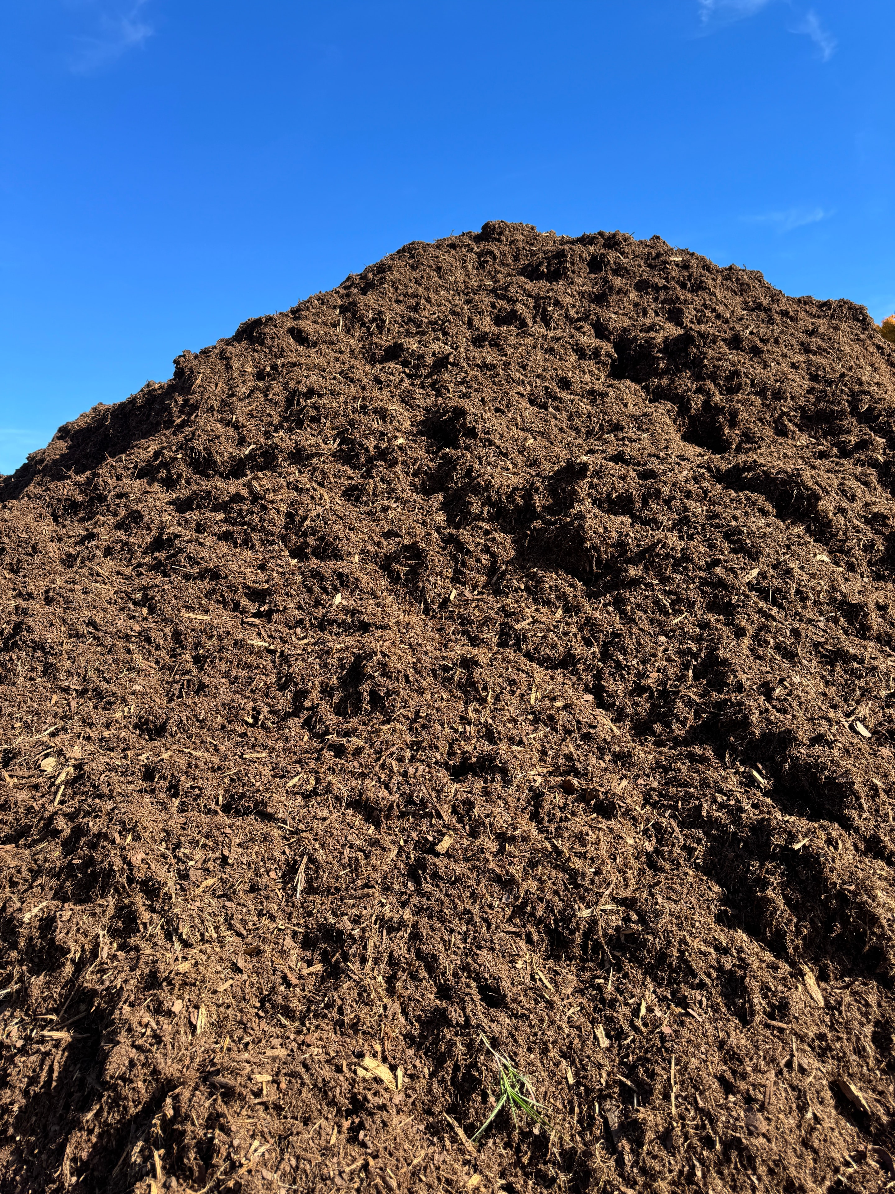 Pile of double ground pine mulch at the garden center