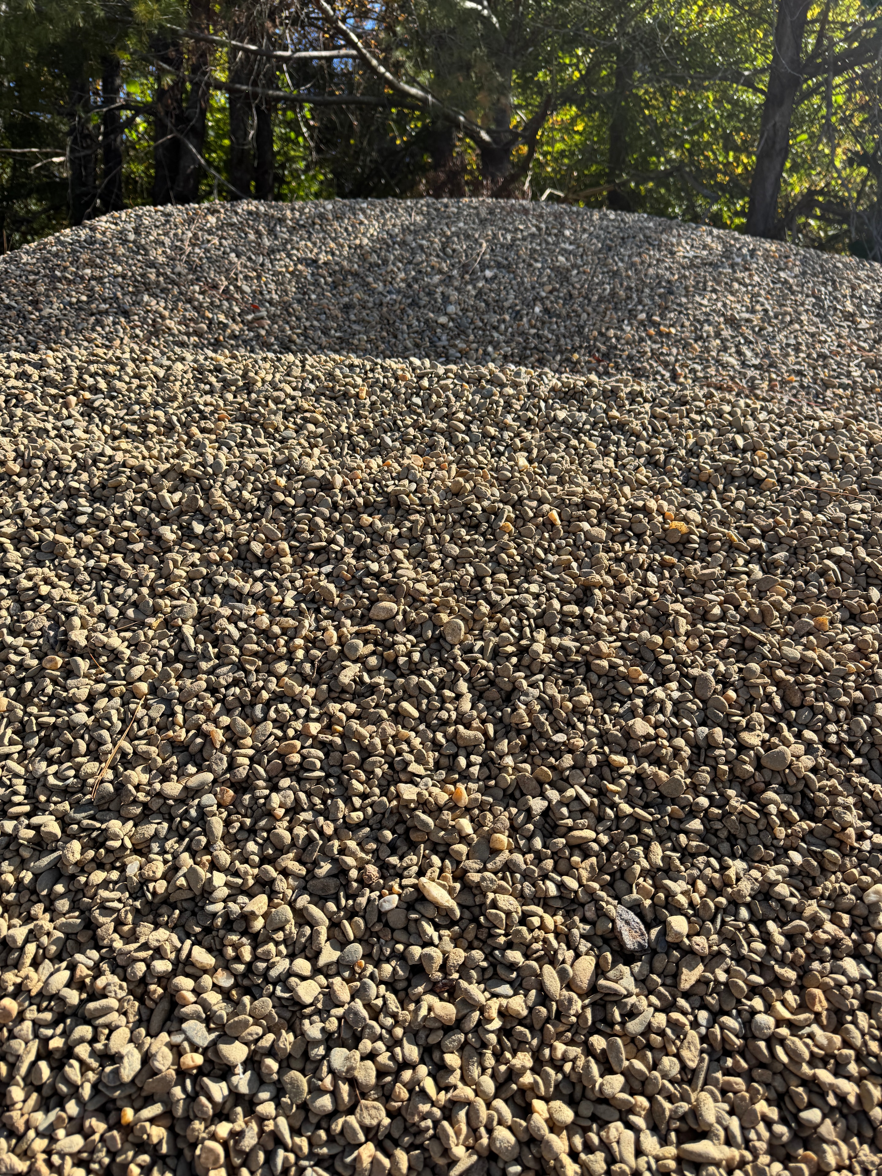 Pile of fine Cane Creek chat crushed stone at the garden center