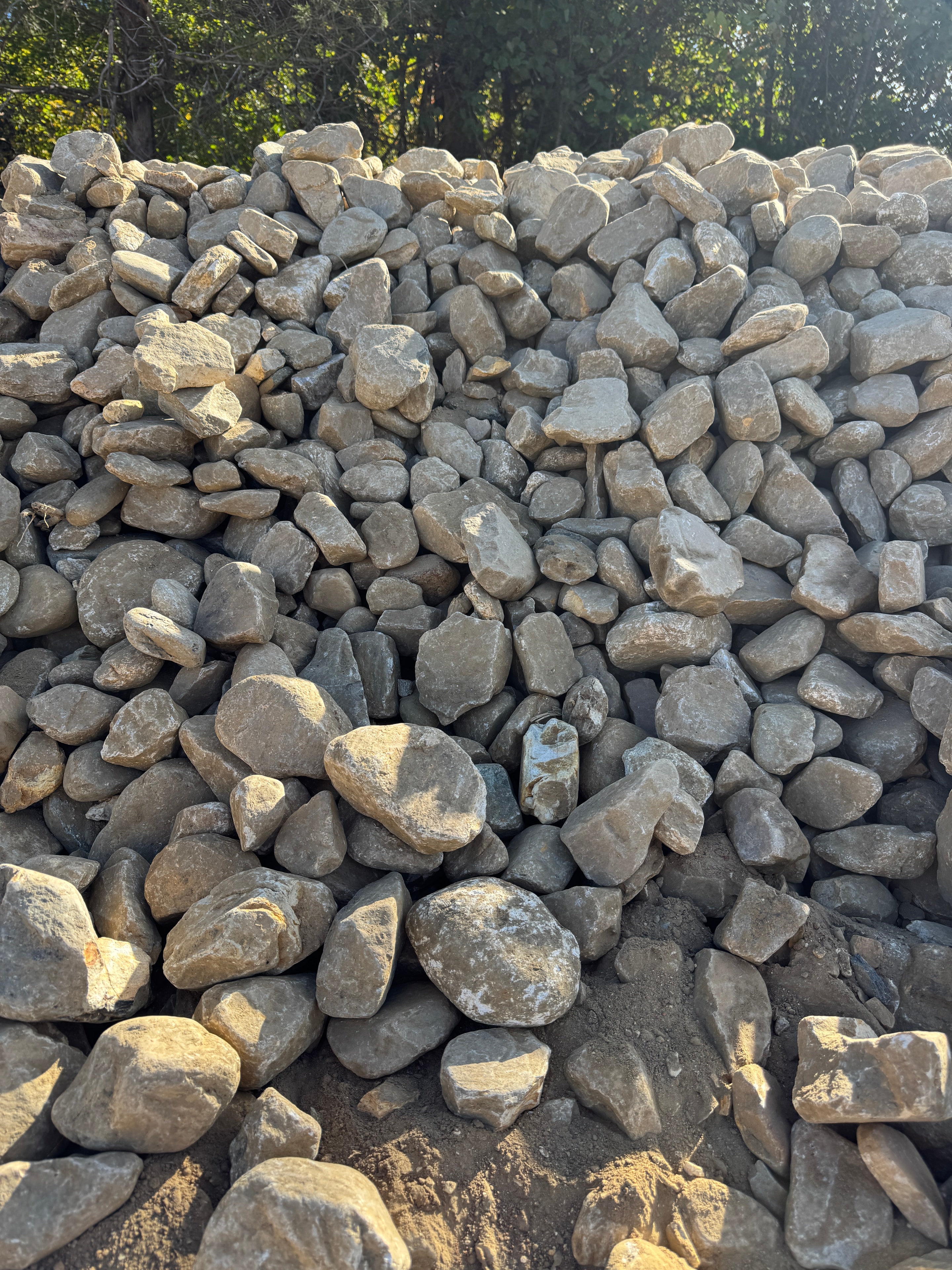 Pile of large smooth Honeycutt river rock, 2 to 5 inches