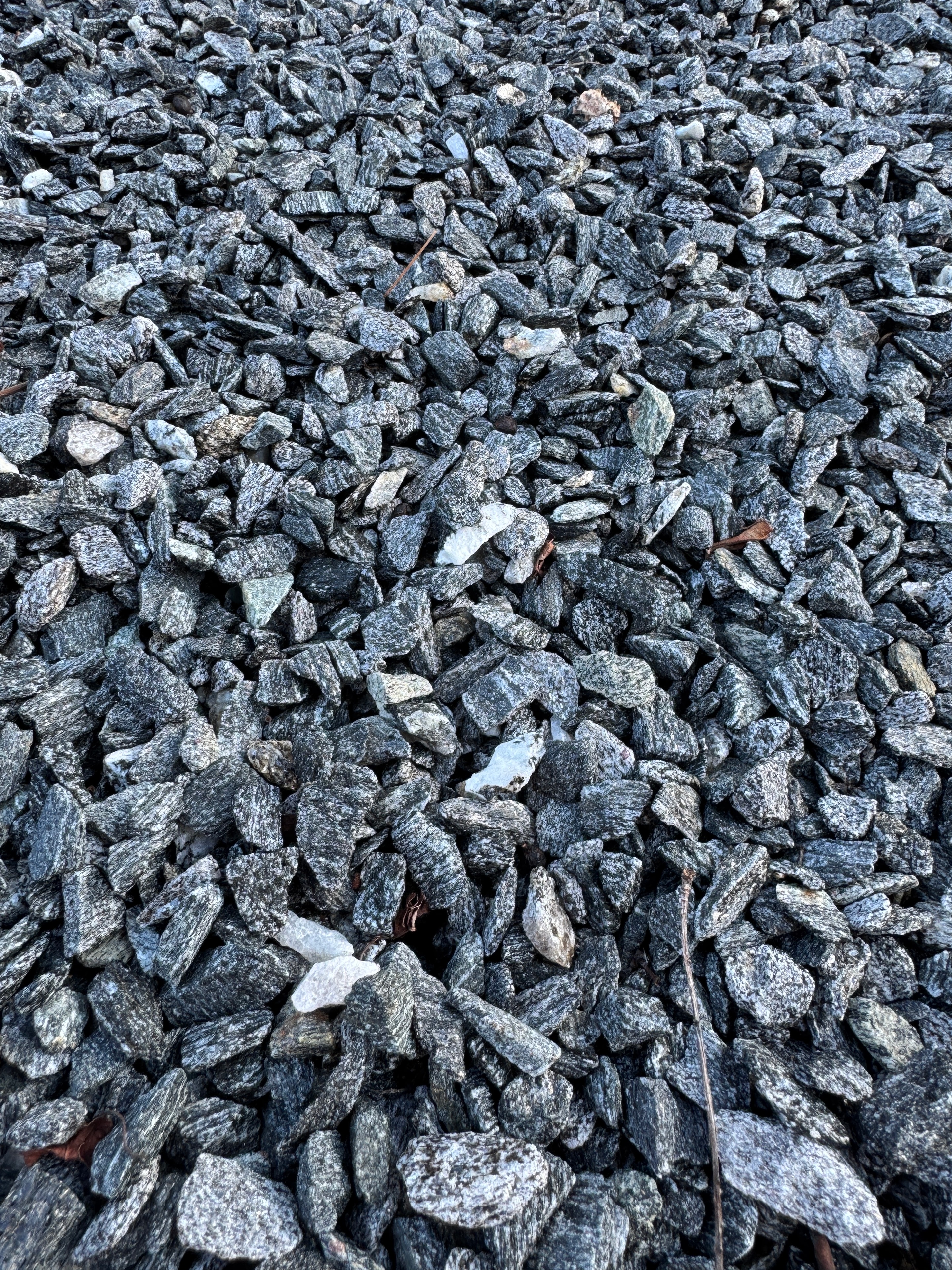 Pile of small smooth pea gravel at the garden center