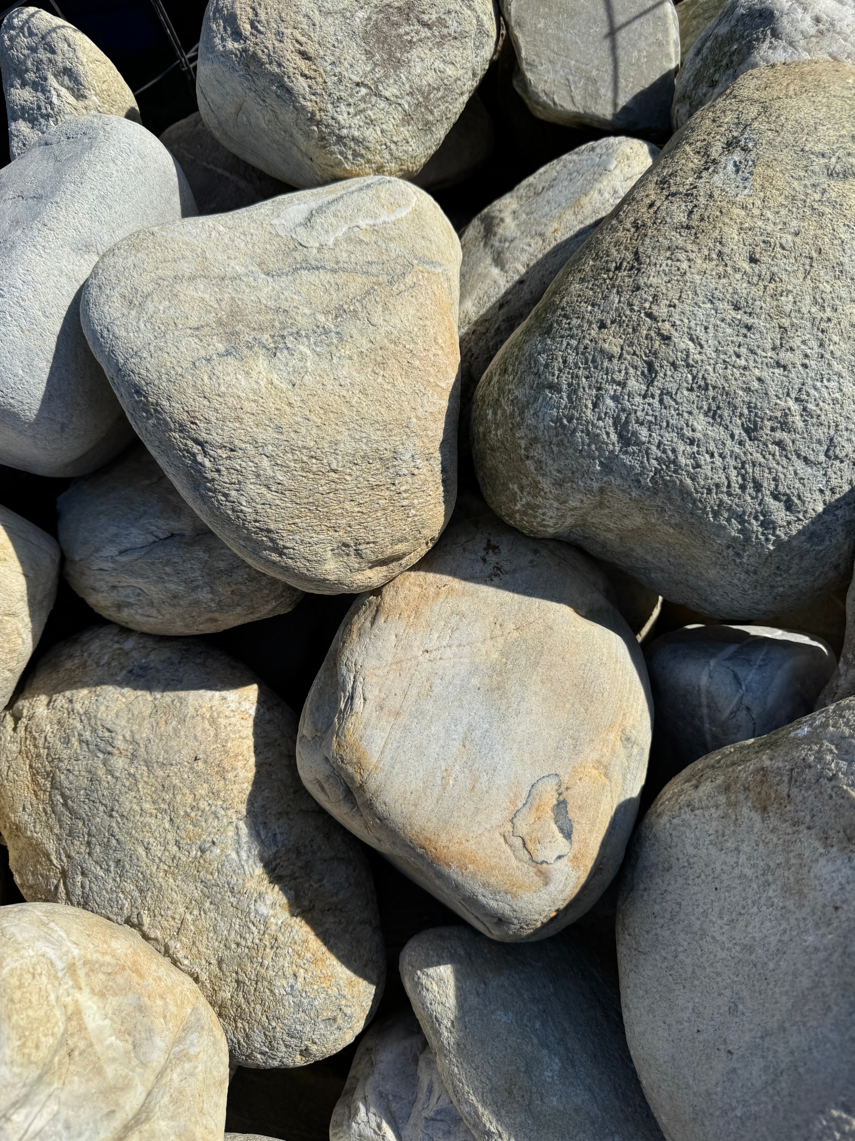 Close-up of large smooth river rocks