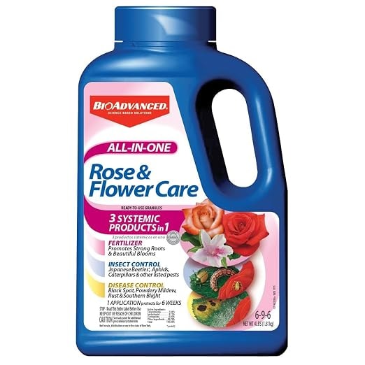 Blue jug of BioAdvanced All-in-One Rose and Flower Care granules