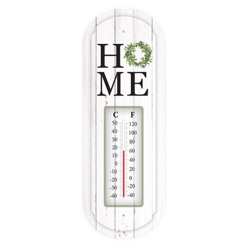 White shiplap-style metal wall thermometer reading HOME with a green boxwood wreath on the O