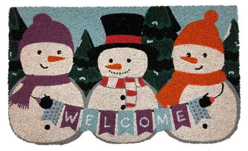 Winter snowmen coir doormat with three snowmen holding a WELCOME pennant banner in front of snowy pine trees